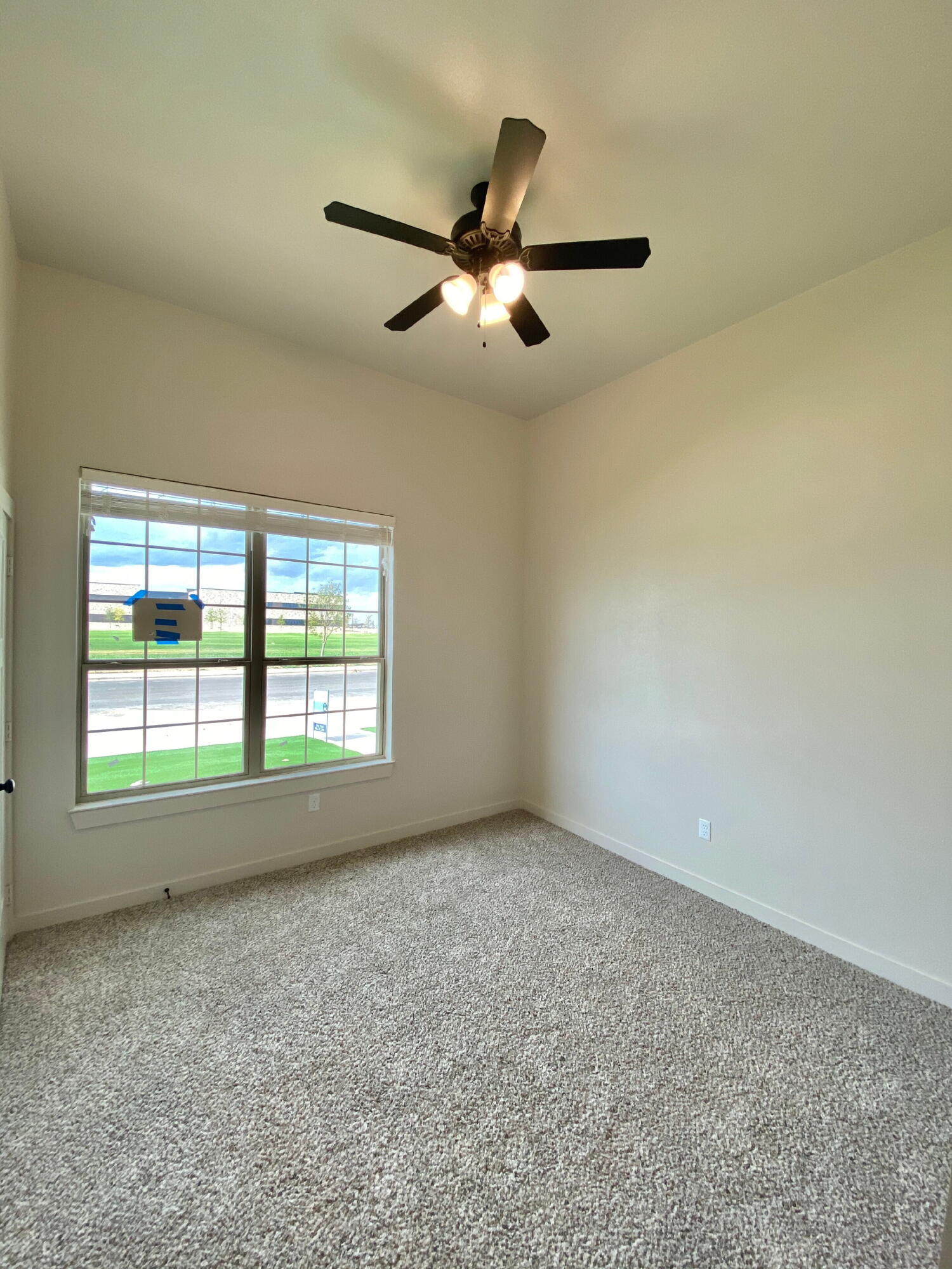 2725 137th Street Lubbock, TX 79423 - Photo 6 of 17 an empty room with a window