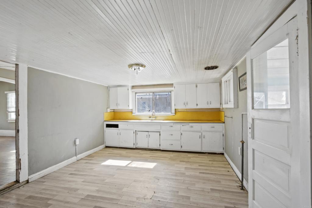 12940 Fourth Street Chino, CA 91710 - Photo 3 of 11 a large white tub sitting in a room next to a window