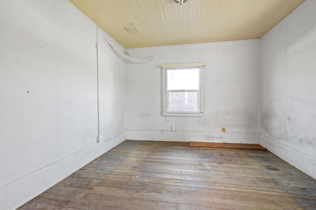 12940 Fourth Street Chino, CA 91710 - Photo 7 of 11 a view of empty room with wooden floor and fan