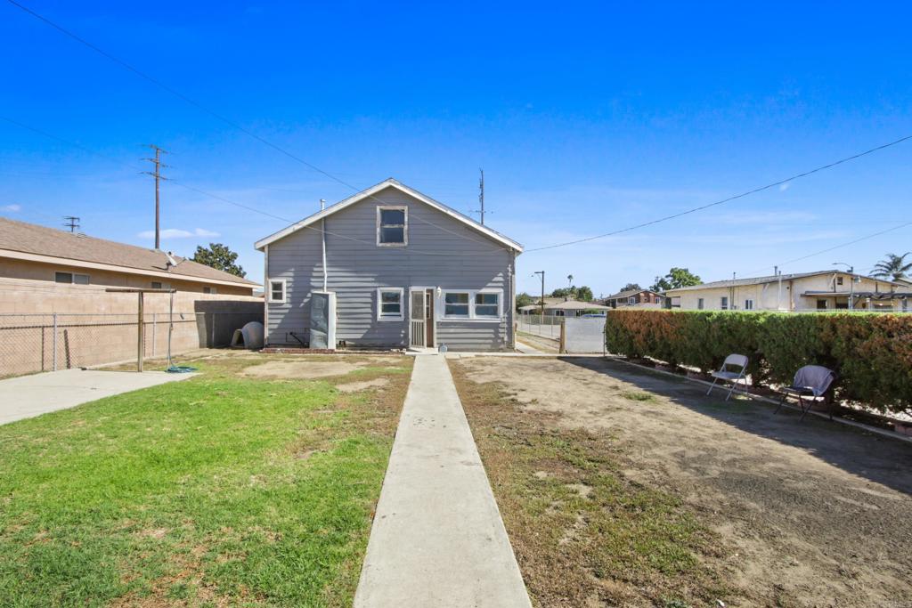 12940 Fourth Street Chino, CA 91710 - Photo 10 of 11 a front view of a house with a yard