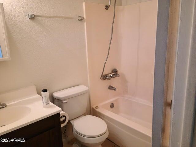8322 North 60th Avenue, Unit 1 Glendale, AZ 85302 - Photo 17 of 37 a white toilet sitting next to a bath tub