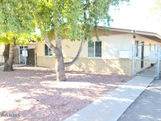 8322 North 60th Avenue, Unit 1 Glendale, AZ 85302 - Photo 2 of 37 a view of a house with a yard