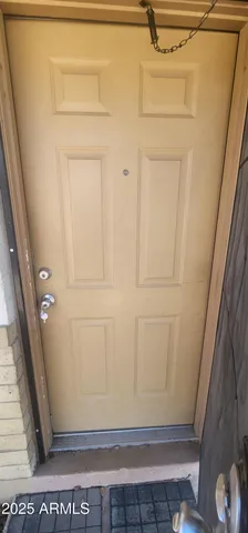 a kitchen with a sink and a stove top oven