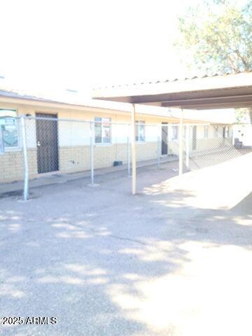 8322 North 60th Avenue, Unit 1 Glendale, AZ 85302 - Photo 3 of 37 a view of an empty room with a window