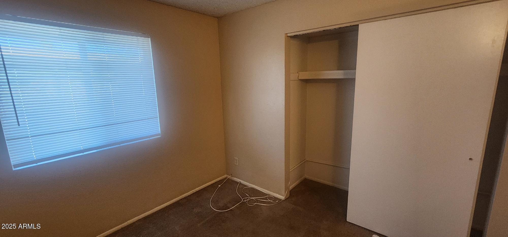 8322 North 60th Avenue, Unit 1 Glendale, AZ 85302 - Photo 35 of 37 a view of an empty room
