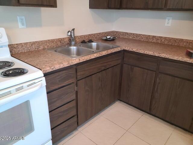 8322 North 60th Avenue, Unit 1 Glendale, AZ 85302 - Photo 7 of 37 a kitchen with a sink and cabinets