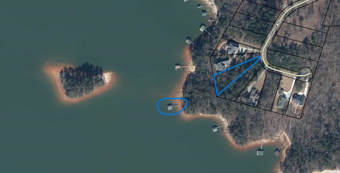 474 Overlook Drive Fair Play, SC 29643 - Photo 2 of 10 A tranquil aerial view reveals a lush waterfront property with an exclusive dock and private lake access.