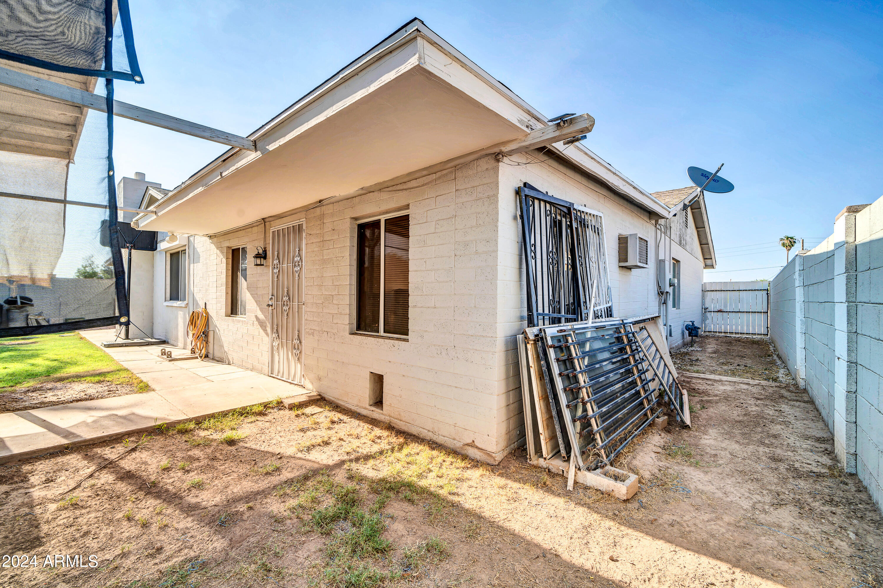 7601 West Osborn Road Phoenix, AZ 85033 - Photo 36 of 37 a house view with a outdoor space