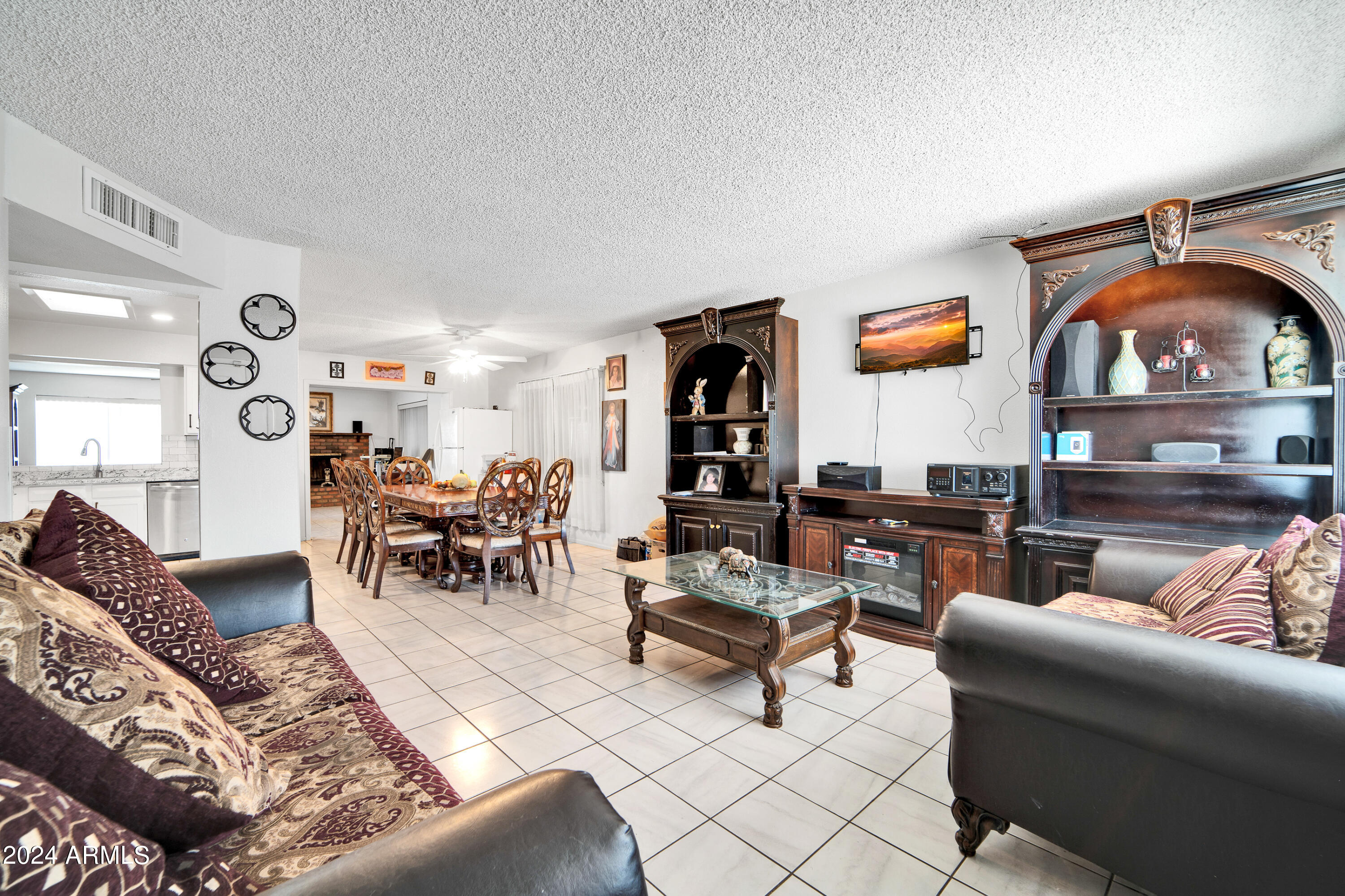 7601 West Osborn Road Phoenix, AZ 85033 - Photo 5 of 37 a living room with furniture and wooden floor
