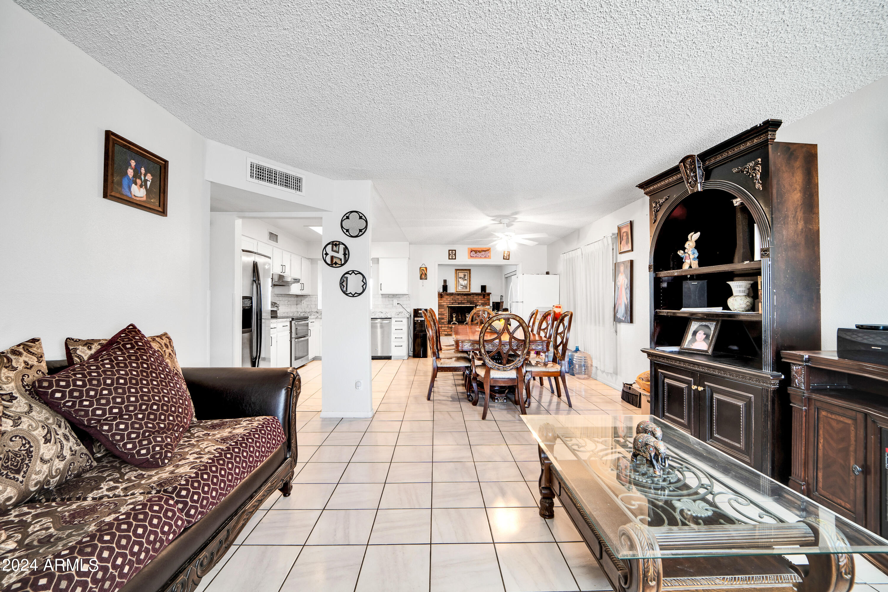 7601 West Osborn Road Phoenix, AZ 85033 - Photo 6 of 37 a living room with furniture