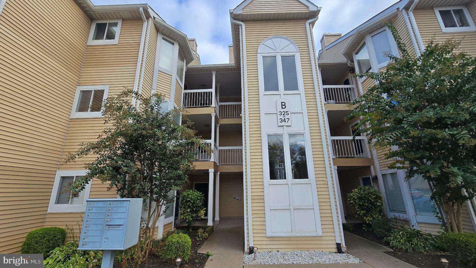 325 Silvia Street Ewing, NJ 08628 - Photo 1 of 21 a front view of a house with a garden