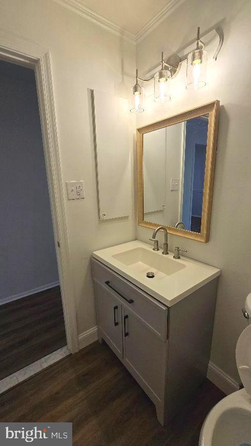 325 Silvia Street Ewing, NJ 08628 - Photo 14 of 21 a bathroom with a sink a mirror and a toilet