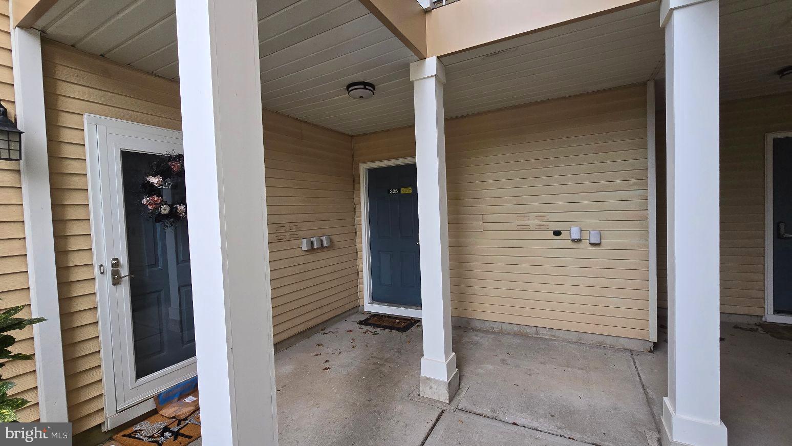 325 Silvia Street Ewing, NJ 08628 - Photo 2 of 21 a view of wooden door