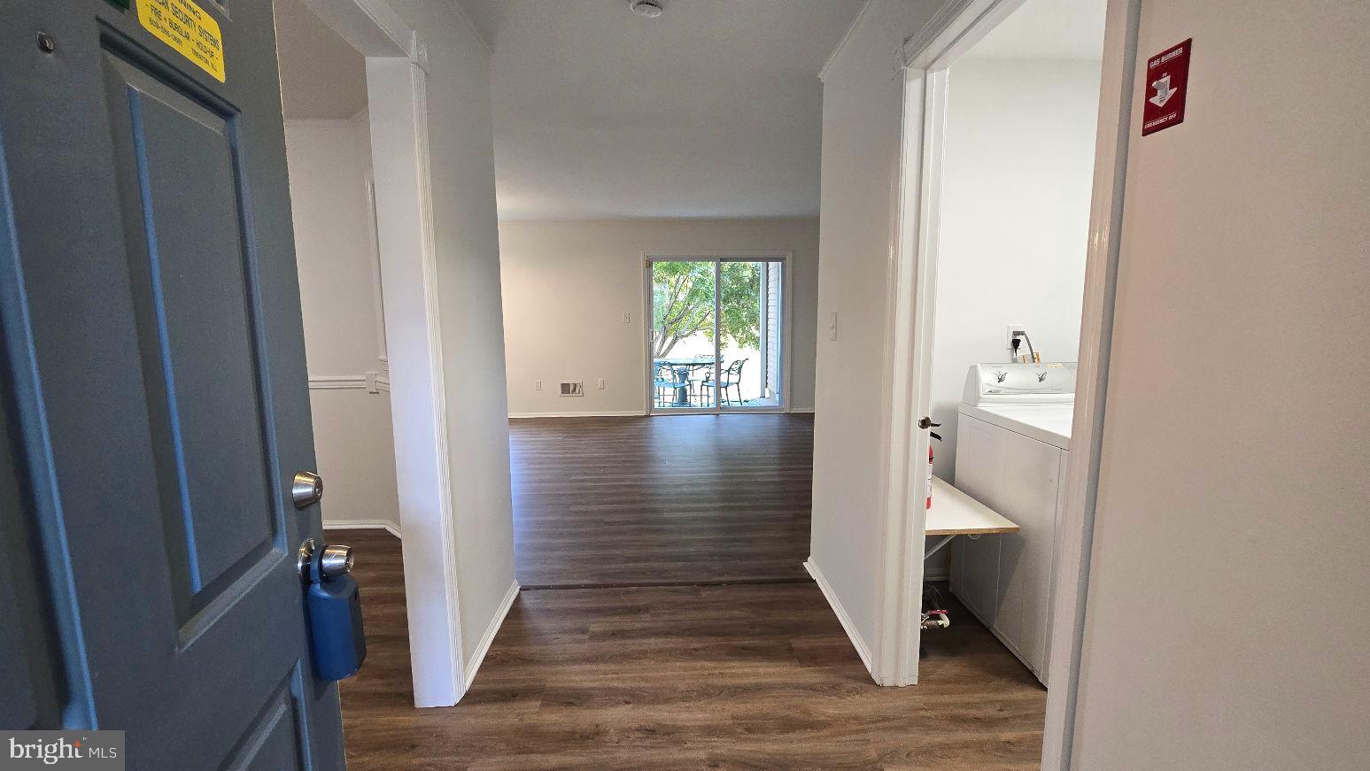 325 Silvia Street Ewing, NJ 08628 - Photo 3 of 21 a view of hallway with wooden floor