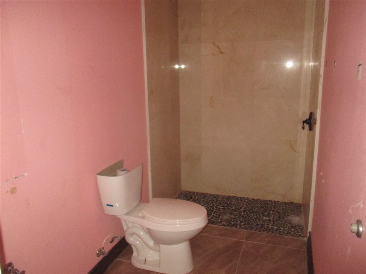 8703 Liberty Loop Laredo, TX 78045 - Photo 14 of 15 a bathroom with a toilet and a sink