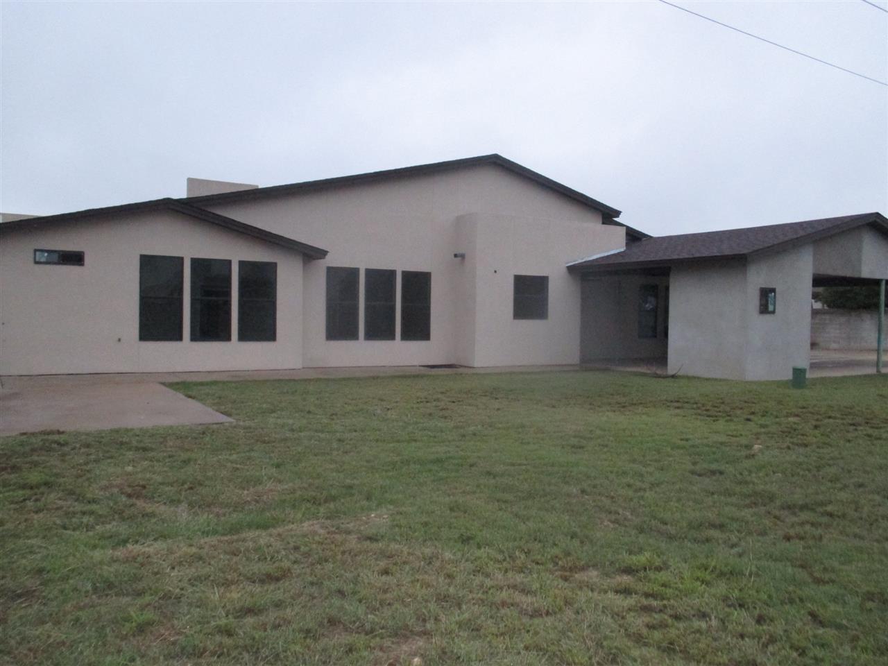 8703 Liberty Loop Laredo, TX 78045 - Photo 2 of 15 a front view of a house with a yard