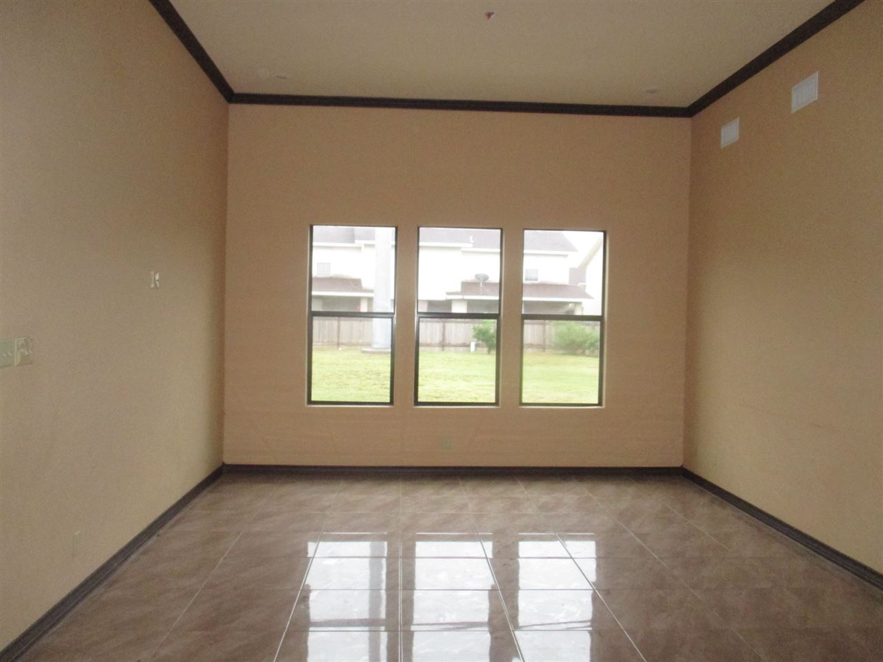 8703 Liberty Loop Laredo, TX 78045 - Photo 4 of 15 an empty room with a window