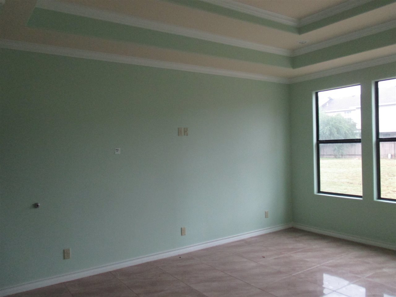 8703 Liberty Loop Laredo, TX 78045 - Photo 7 of 15 an empty room with windows