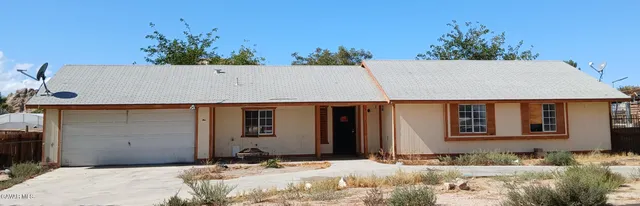 a view of swimming pool with a bench
