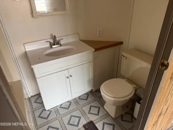 a bathroom with a sink and a toilet