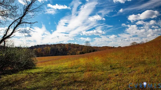 a view of mountain with sunset
