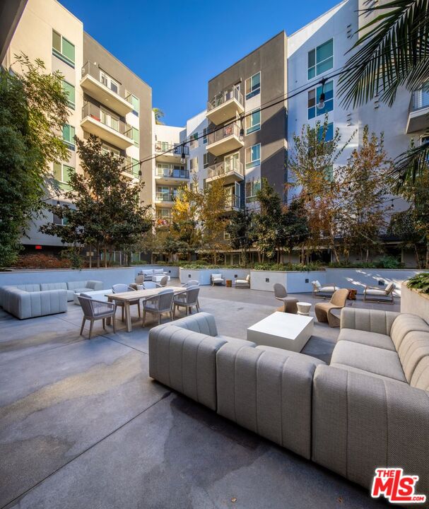 1120 West 6th Street, Unit 2257 Los Angeles, CA 90017 - Photo 19 of 51 a outdoor space with patio couch and a fire pit