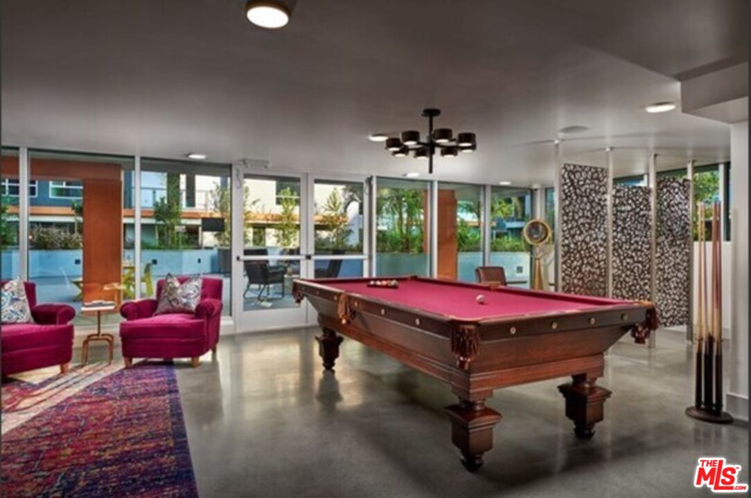 1120 West 6th Street, Unit 2257 Los Angeles, CA 90017 - Photo 41 of 51 a room with pool table and windows