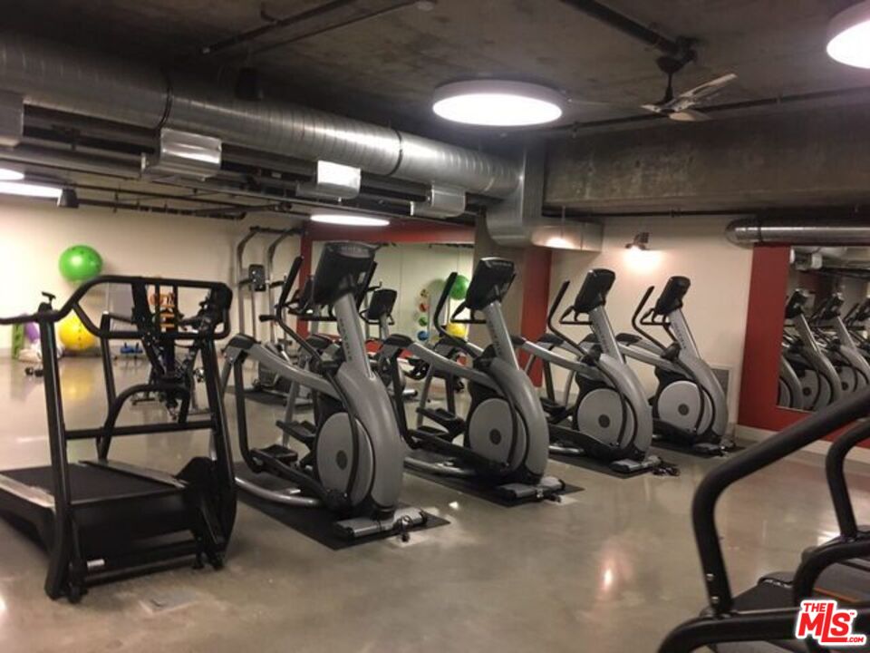 1120 West 6th Street, Unit 2257 Los Angeles, CA 90017 - Photo 44 of 51 a view of a room with gym equipment