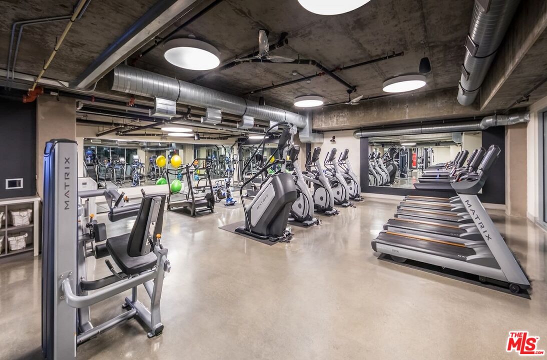 1120 West 6th Street, Unit 2257 Los Angeles, CA 90017 - Photo 50 of 51 a view of a room with gym equipment