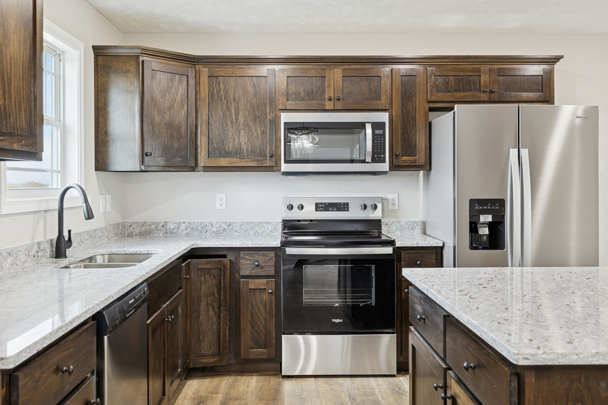 2623 Oak Knob Road Lafayette, TN 37083 - Photo 11 of 36 a kitchen with a sink stove and refrigerator