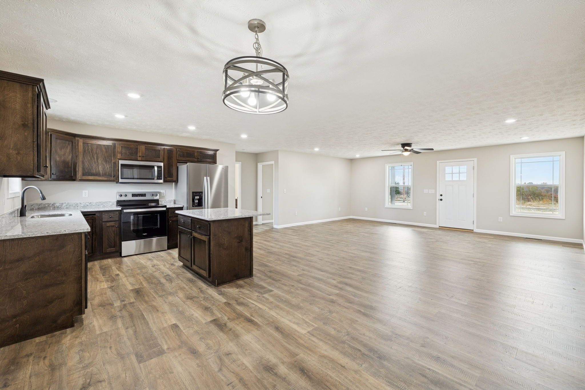 2623 Oak Knob Road Lafayette, TN 37083 - Photo 14 of 36 a kitchen with a refrigerator and a microwave
