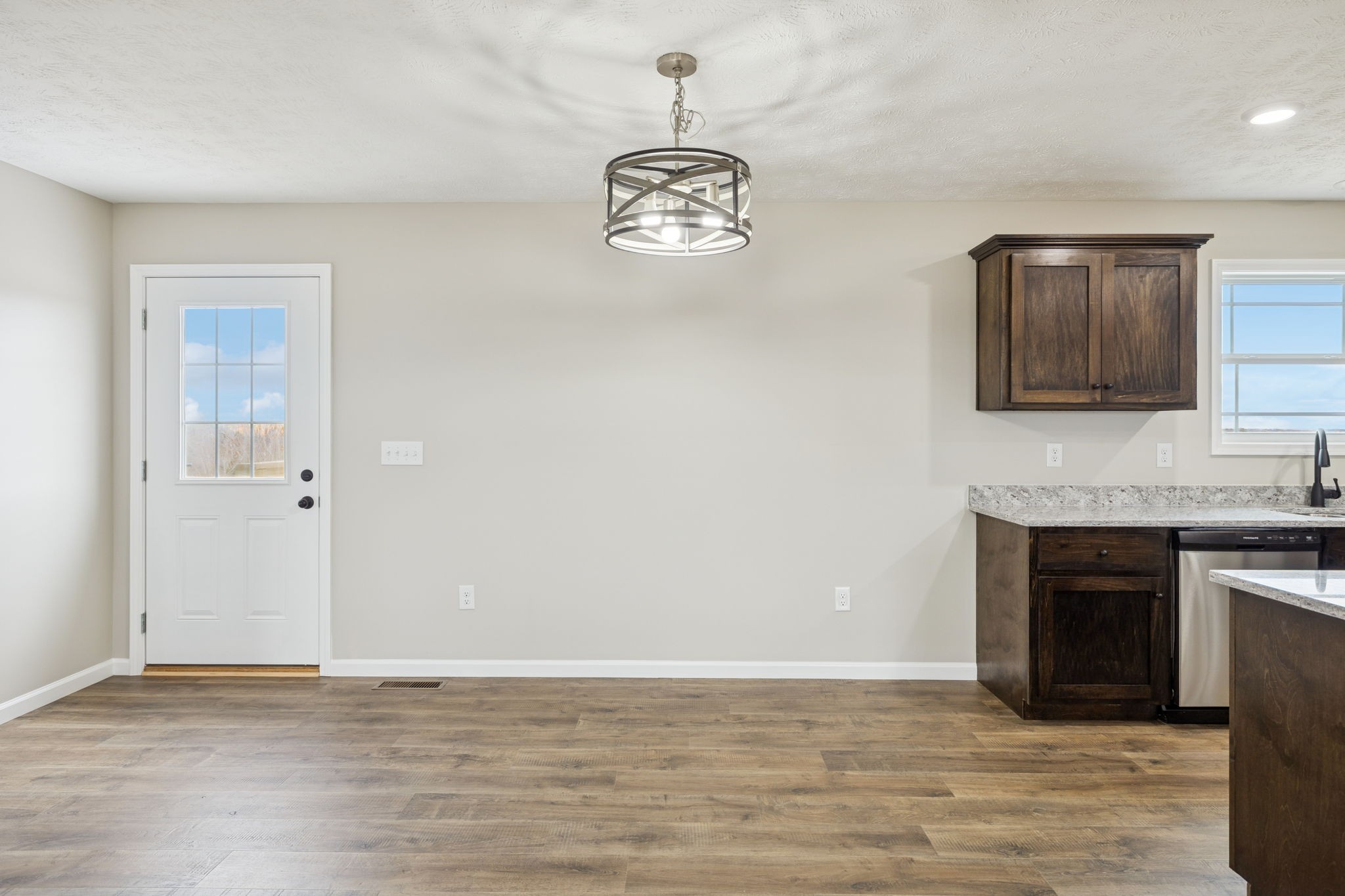 2623 Oak Knob Road Lafayette, TN 37083 - Photo 15 of 36 a view of an empty room with wooden floor and a window