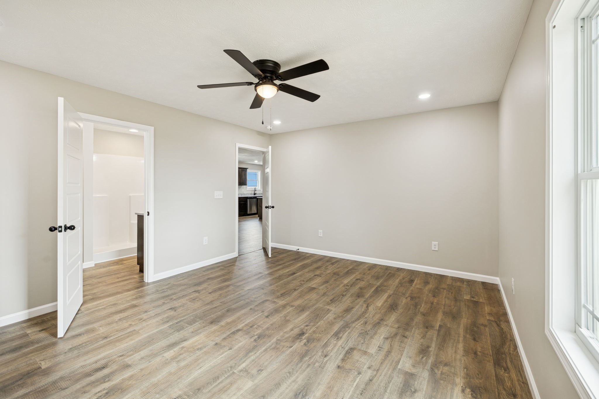 2623 Oak Knob Road Lafayette, TN 37083 - Photo 19 of 36 wooden floor in an empty room with a window