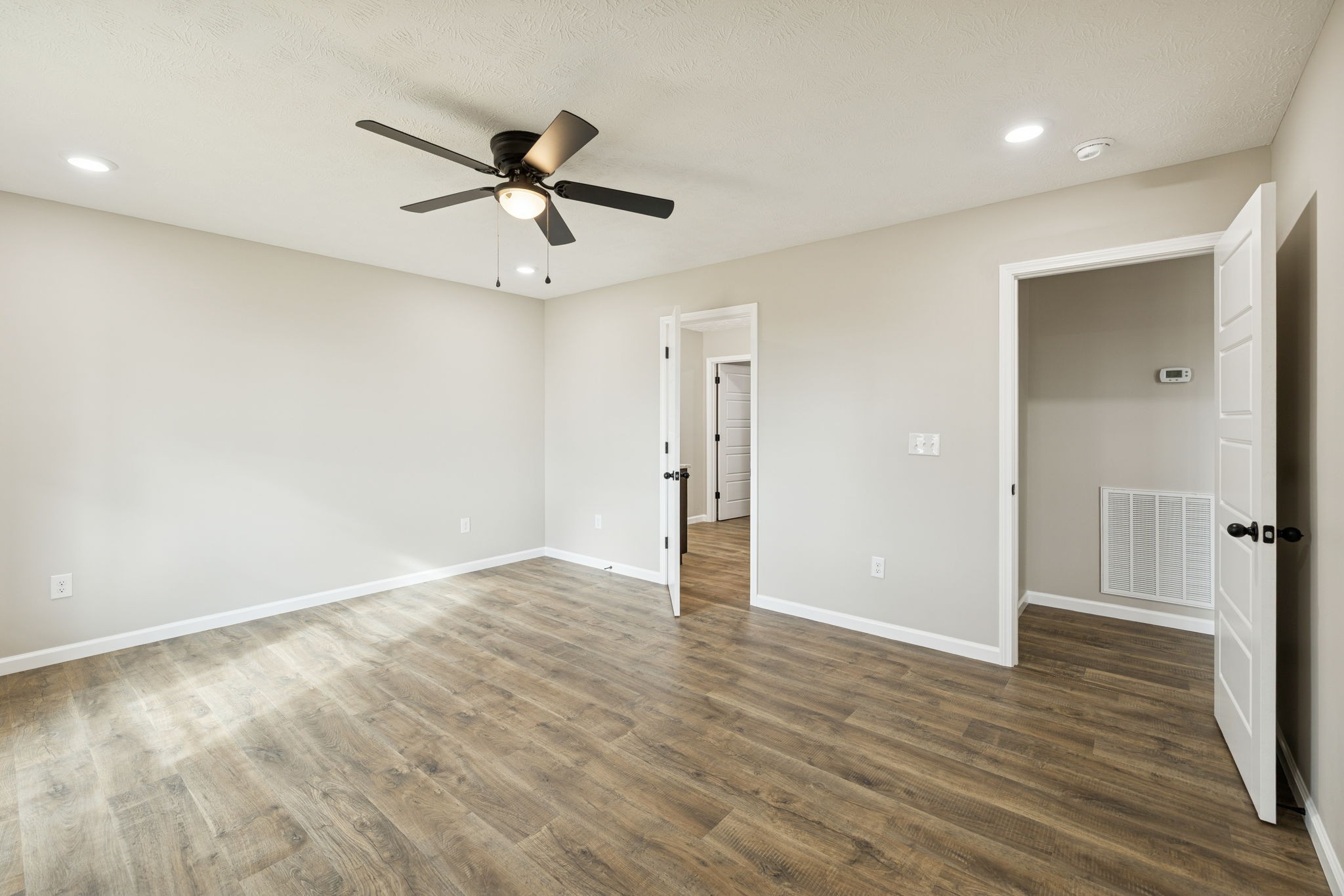 2623 Oak Knob Road Lafayette, TN 37083 - Photo 20 of 36 wooden floor in an empty room with a window