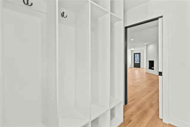 a view of a bathroom from a hallway