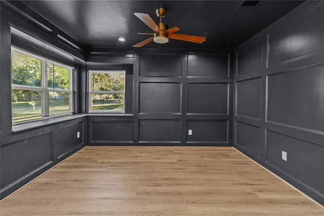 a bathroom with a tub and a shower