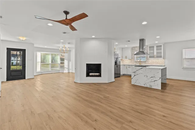 a view of kitchen and windows