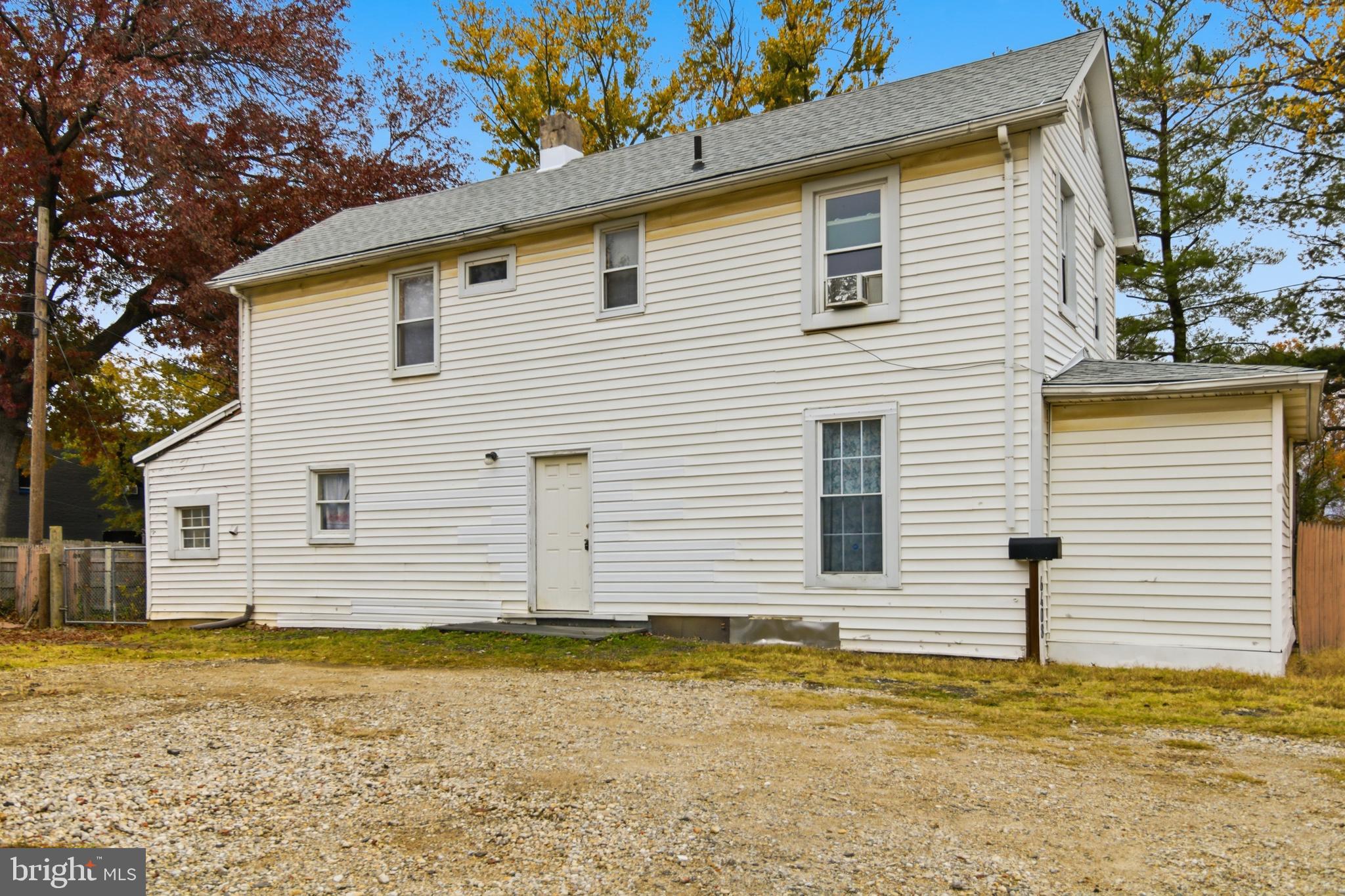 6408 Eastbourne Avenue Baltimore, MD 21224 - Photo 2 of 34 a view of a house with a yard