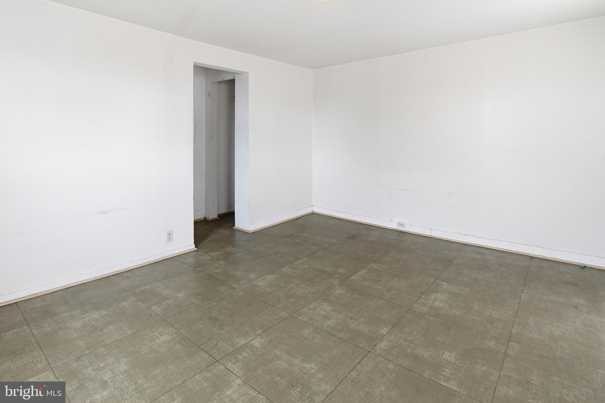 6408 Eastbourne Avenue Baltimore, MD 21224 - Photo 27 of 34 an empty room with an entryway