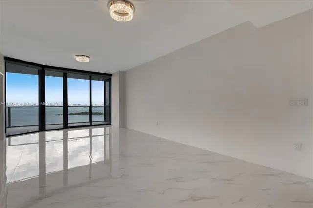 a view of a park with swings and slides