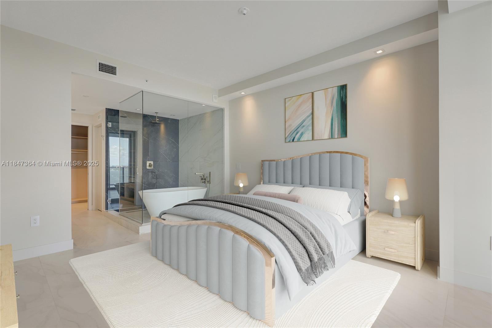 700 Northeast 24th Street, Unit 1603 Miami, FL 33137 - Photo 28 of 67 a bedroom with a large bed and a chandelier