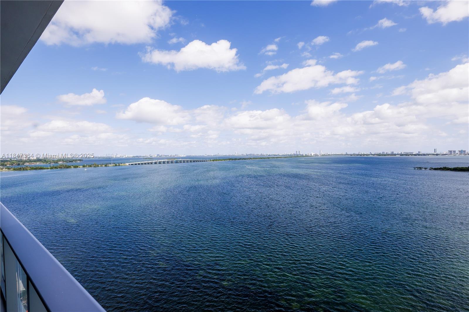 700 Northeast 24th Street, Unit 1603 Miami, FL 33137 - Photo 8 of 67 a view of a lake from a yard