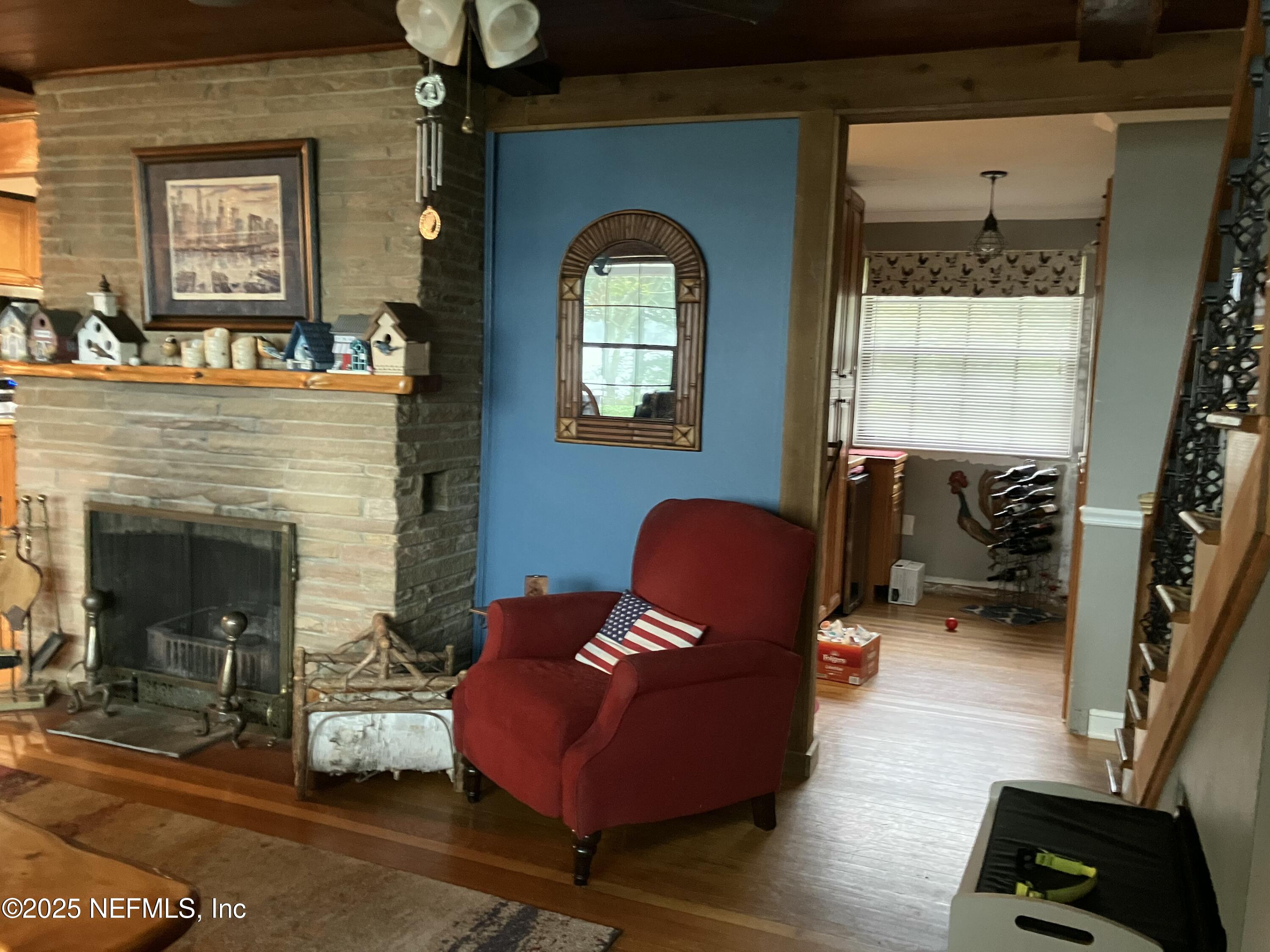 1375 Cedar Bay Road Jacksonville, FL 32218 - Photo 14 of 91 a living room with furniture and a fireplace