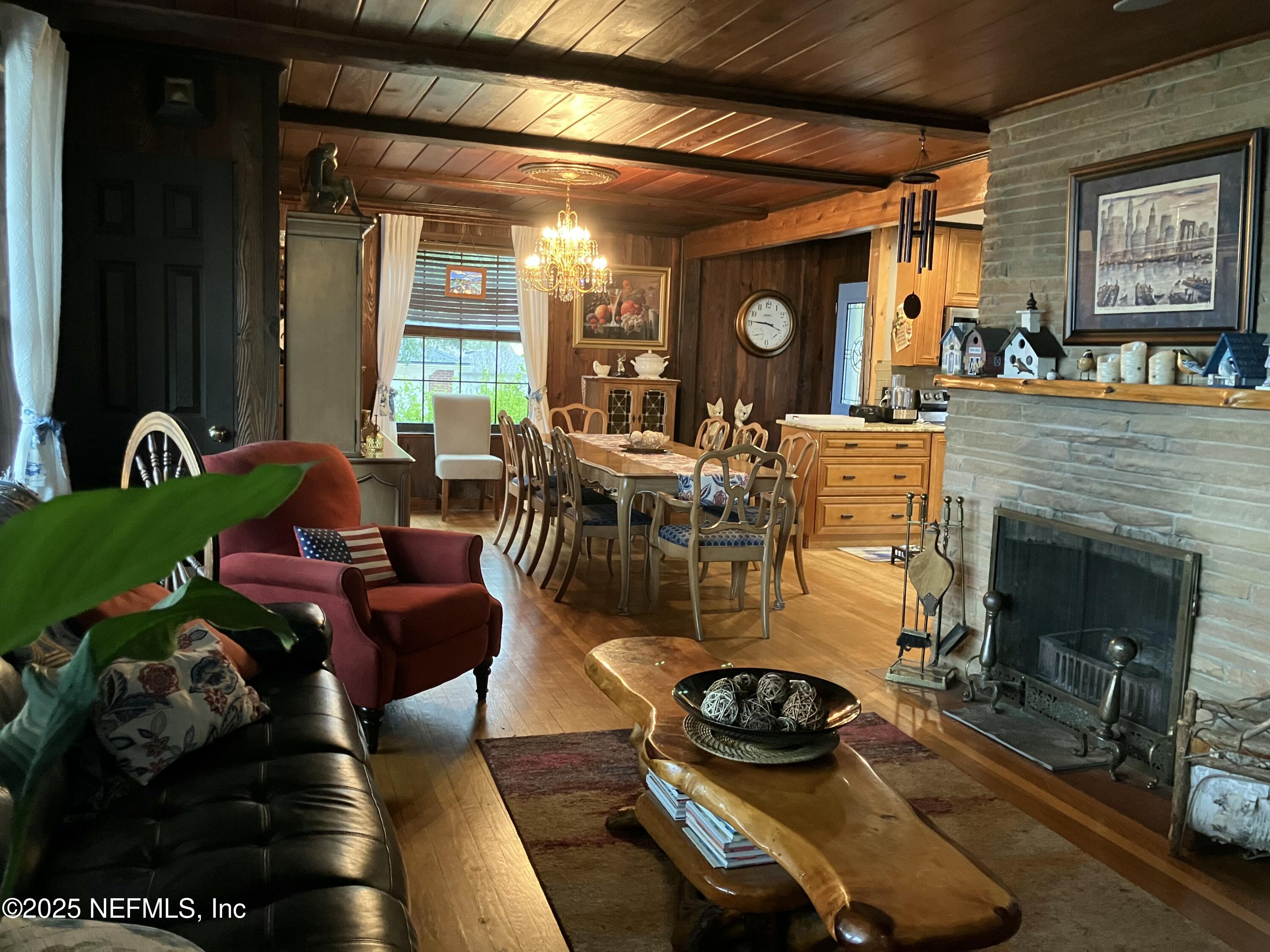 1375 Cedar Bay Road Jacksonville, FL 32218 - Photo 15 of 91 a living room with furniture and a fireplace