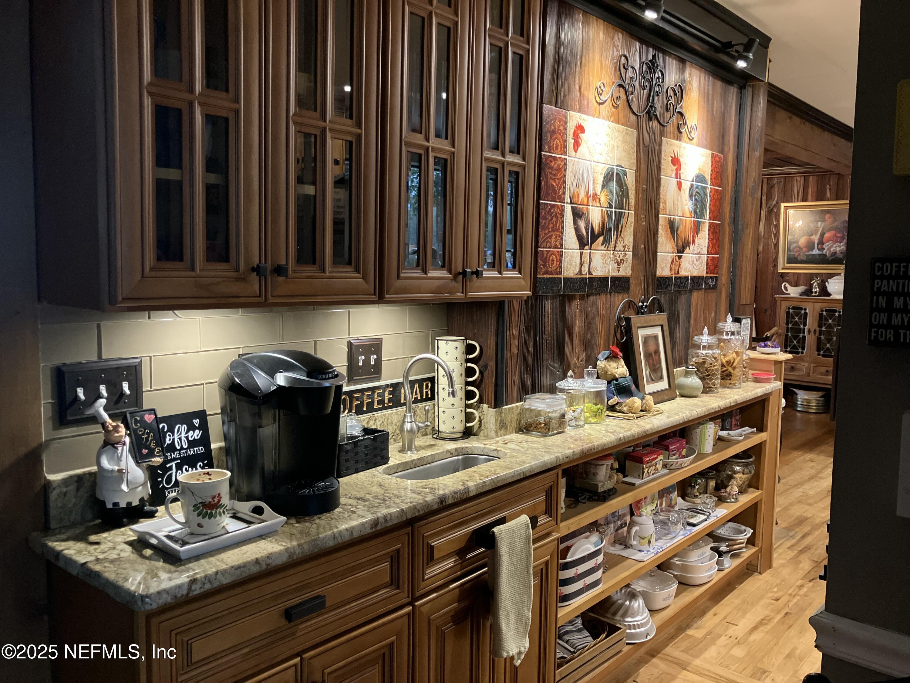 1375 Cedar Bay Road Jacksonville, FL 32218 - Photo 31 of 91 a kitchen with a sink and cabinets