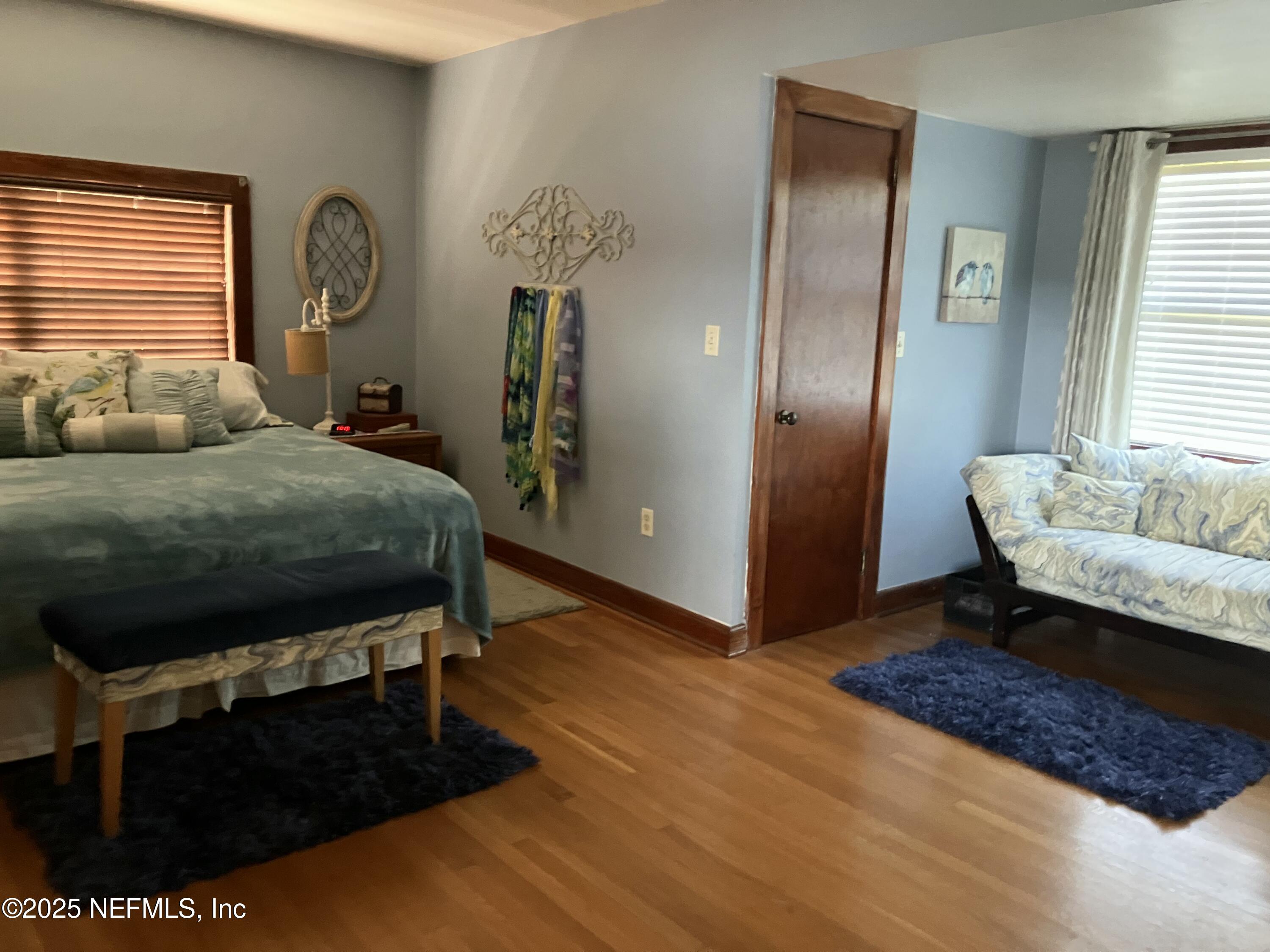 1375 Cedar Bay Road Jacksonville, FL 32218 - Photo 51 of 91 a bedroom with a bed and a mirror on dresser