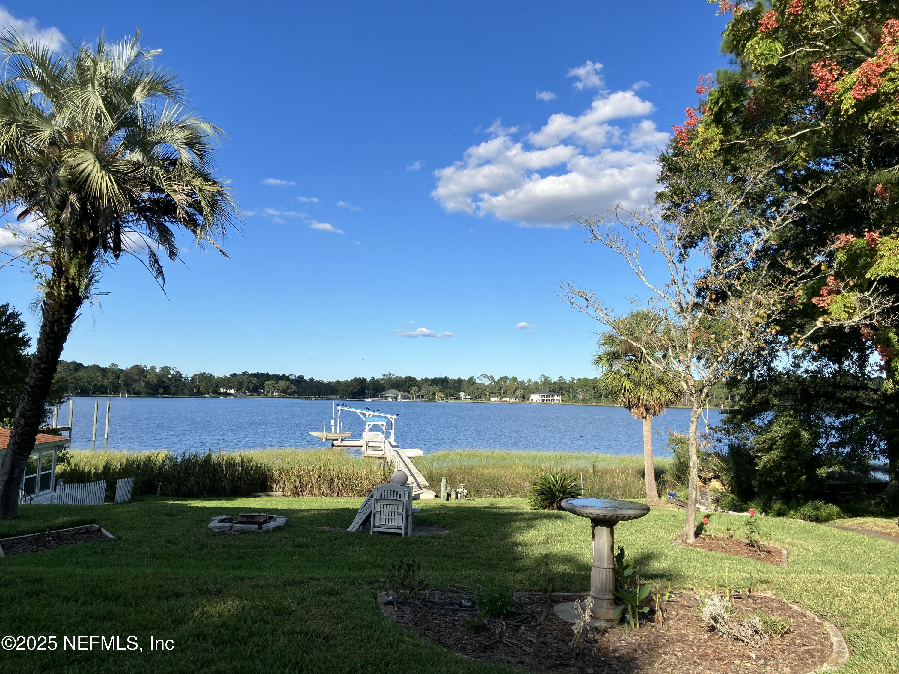 1375 Cedar Bay Road Jacksonville, FL 32218 - Photo 86 of 91 a view of a lake with houses in the back