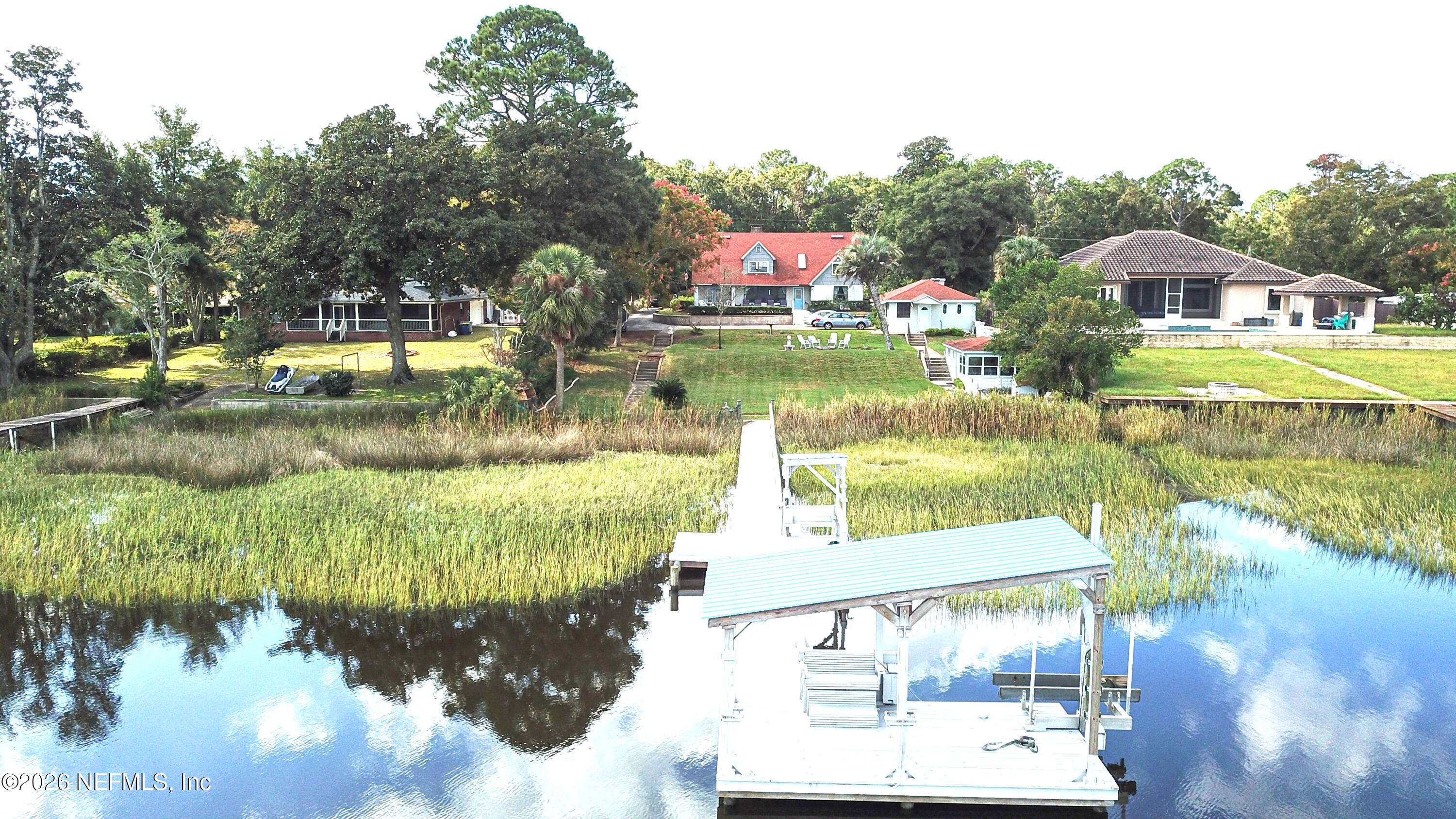 1375 Cedar Bay Road Jacksonville, FL 32218 - Photo 89 of 91 a view of swimming pool with a garden and lake view