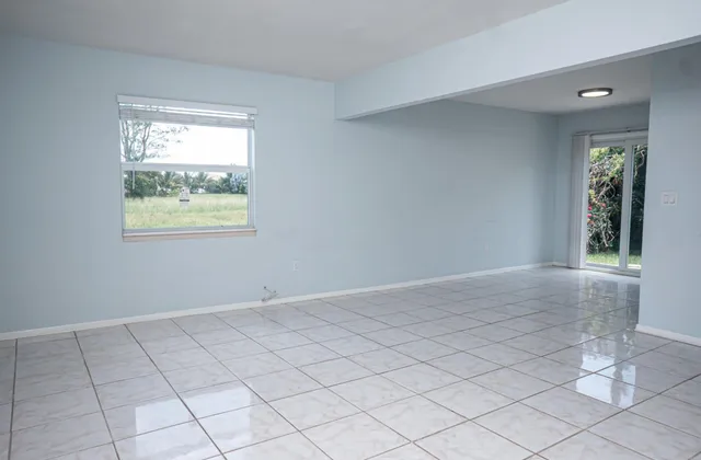 a view of an empty room and window