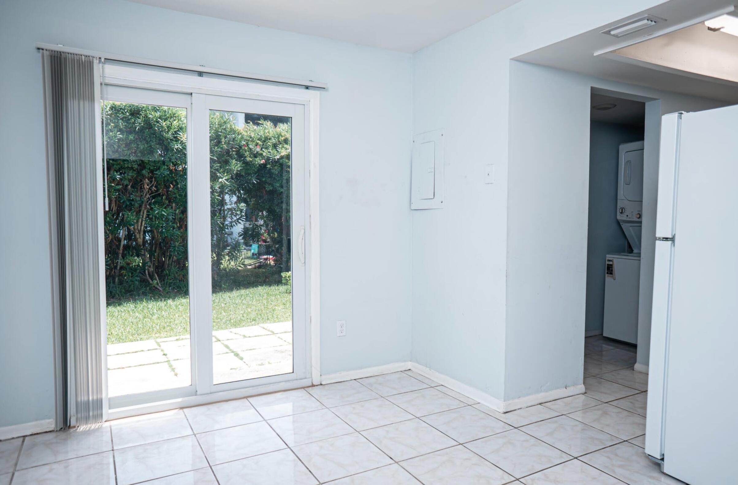 646 Eldorado Street, Unit 2 Fort Pierce, FL 34949 - Photo 4 of 11 a view of an empty room and window